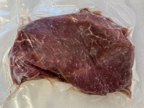 Chuck Ranch Steak, vacuum-sealed pack.