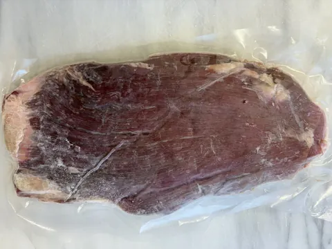 Flank Steak, vacuum-sealed pack.