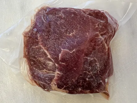 Sirloin Tip Steak, vacuum-sealed pack.